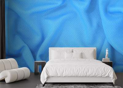 Blue jersey polyester fabric texture background, sports wear background. Wall mural