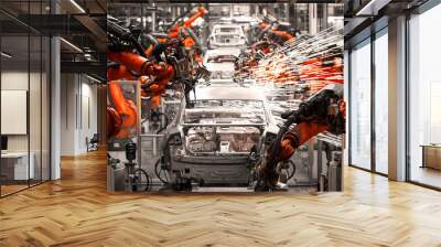 The robotic arm of the car production plant is working Wall mural