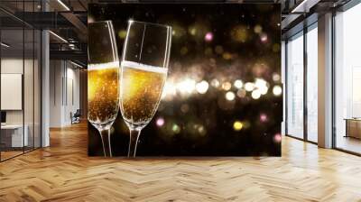 celebrating new year 2022 with 2 glasses of champagne on beautiful unfocused background Wall mural