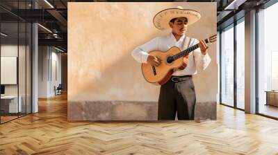 Mexican musician with his guitar wearing a hat and traditional Mexican attire singing songs. in his town Wall mural