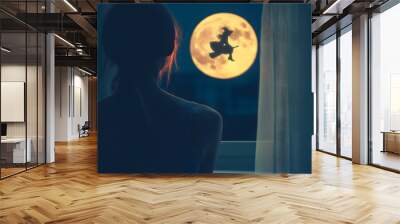 woman looking out the window at a witch flying under the light of the full moon on halloween night Wall mural