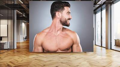 Face, beard and skincare with a man model topless in studio on a gray background for hygiene or grooming. Health, wellness and aesthetic with a muscular or handsome male posing shirtless indoor Wall mural