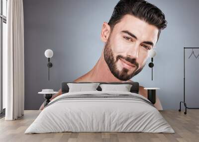 Skincare, smile and health, portrait of man with happy face, hair and beard growth and maintenance. Fitness, health and spa facial care, male model with muscle in studio isolated on grey background. Wall mural