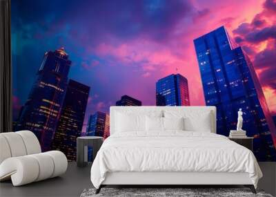 urban skyline at dusk, with skyscrapers lit up against a colorful sky Wall mural