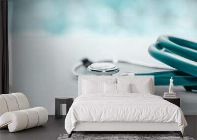 Stethoscope or phonendoscope on a doctor's white desk on cloudy morning. Treatment of cold or flu. Wall mural