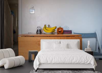 Fresh ripe banana fruit on living room table Wall mural