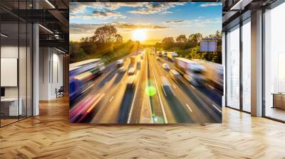 heavy traffic moving at speed on UK motorway in England at sunset Wall mural