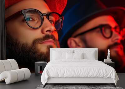  A close-up of a man in hat and glasses Another man, bearded, also wears a hat and glasses Wall mural