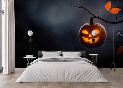  A jack-o-lantern suspended from a tree branch against a dark night sky, illuminated by the full moon Wall mural