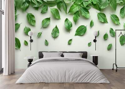  A pristine white background hosts an array of vibrant green leaves above, with an allotted area reserved below for text or logos Wall mural