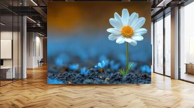  a single white flower sitting in the middle of a field of blue and yellow flowers on top of a black ground. Wall mural