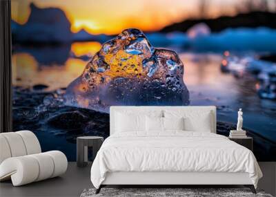  A tight shot of an ice fragment atop still water, with a sunset background Wall mural