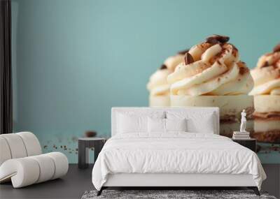  Two desserts atop a table, laden with chocolate chips and smothered in whipped cream Wall mural