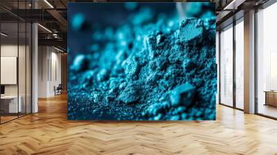 blue, sits atop a table in the same shade Nearby, a mound of similar blue-tinted powder accumulates Wall mural