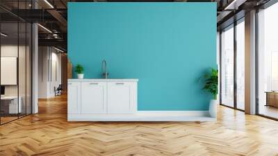 A modern kitchen space featuring a turquoise wall, sleek white cabinetry, a sink, and a vibrant green plant in a white pot. Wall mural