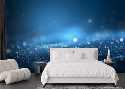 A dark blue abstract background featuring a glow particle effect. The image includes abstract blue lights and star particles, forming a captivating scene with dots on a dark background. Wall mural