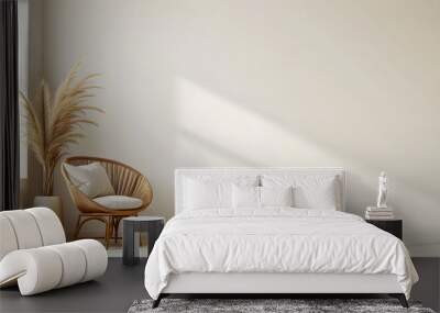 Interior room setting with an empty beige wall for mockups. Cozy brown wicker chair sits beside a potted plant. Natural daylight filters in through a window, casting shadows, copy space. Wall mural