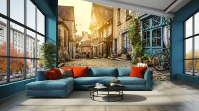 Charming street scene in an old town in Europe at sunset Wall mural