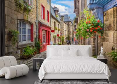 Idyllic scene of traditional houses in narrow alley in an old town in Europe Wall mural