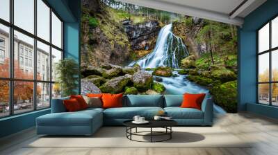 Idyllic waterfall scene with mossy rocks in the forest Wall mural