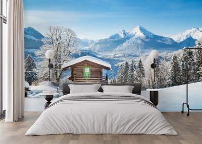 Traditional mountain hut in the Alps in winter Wall mural