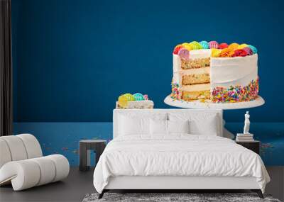 Colorful Birthday Cake with Slice and Sprinkles Wall mural