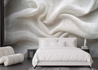 Soft white fabric draped elegantly on a surface, capturing light and texture in detail Wall mural