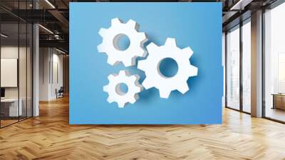 Blue background and three gears. Wall mural