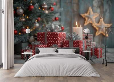 3D rendering of beautifully wrapped Christmas presents in red and silver with white dots next to a decorated tree and lit star-shaped candles against a wooden wall. Wall mural