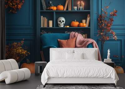 Cozy living room interior featuring an armchair, grey bookcase with skulls and pumpkins, and modern Halloween decor against a dark blue wall. Wall mural