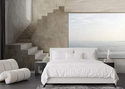 Empty room interior featuring a window and stairs in the background, with minimalistic beige concrete wall texture and a view of the sea or ocean. Wall mural