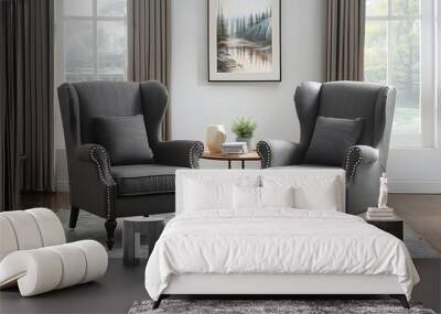 Set of two grey wingback armchairs with wooden legs and nailhead trim, in a cozy contemporary living room setting, front view. Wall mural