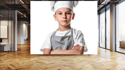 A young boy wearing a chef's hat and apron stands with his arms crossed Wall mural