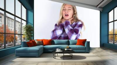 beautiful caucasian teen girl wearing plaid purple shirt over white wall shouting suffocate because painful strangle. Health problem. Asphyxiate and suicide concept. Wall mural