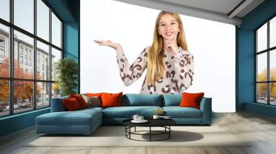 Funny Beautiful caucasian teen girl hold open palm new product great proposition Wall mural