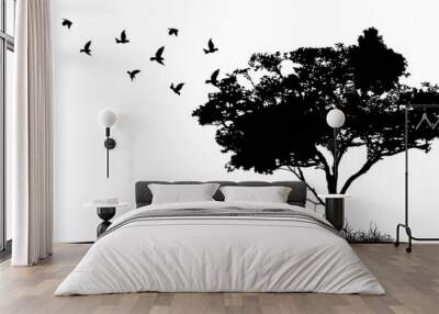 tree silhouette with birds flying Wall mural