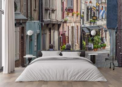 Two Women Walking Down a Narrow Lane in the Ancient Historic Port City of Honfleur, France Wall mural