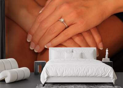 Beautiful hands modeling a solitaire diamond engagement ring Wall mural