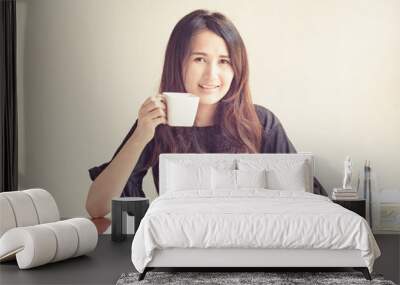 Woman drinking Wall mural