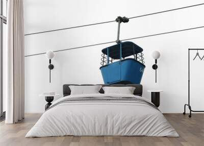 Isolated blue gondola lift with cables Wall mural