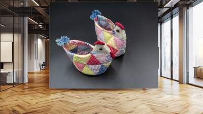 Close up and top angle view of two handmade cloth basket with chicken shape and colorful decoration black floor, South Korea
 Wall mural