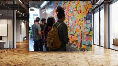 Creative team brainstorming with sticky notes on board Wall mural