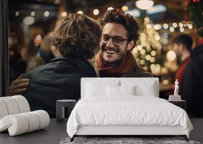 Two young men having a good time together at a Christmas market Wall mural