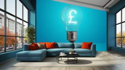 Money making idea. Light bulb with Pound symbol. Wall mural