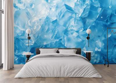 A blue background with ice cubes scattered throughout. The ice cubes are in various sizes and shapes, creating a sense of depth and texture. Scene is cool and refreshing Wall mural