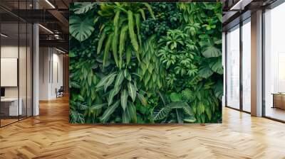 A lush green plant with leaves that are shaped like hearts. The leaves are green and appear to be healthy Wall mural