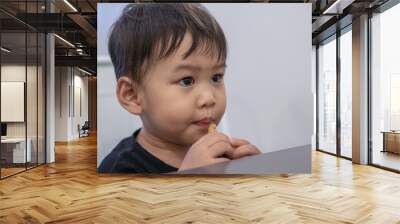 Children are sitting to eat French fries at restaurants. Wall mural