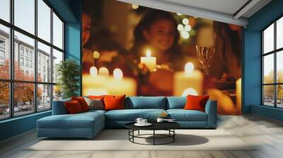 A warm family gathering with glowing candles, creating a cozy atmosphere during a festive celebration. Wall mural