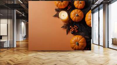 Happy halloween banner template. Flat lay composition with pumpkin and candles on orange background. Wall mural