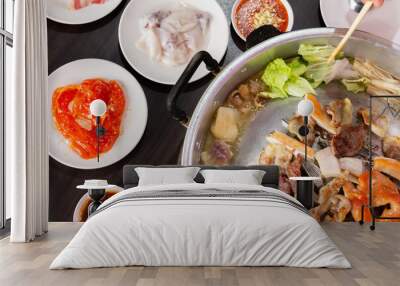 Thai food style. shabu sukiyaki or Moo-Ka-Ta griiled pork. Wall mural